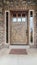 Vertical frame Entrance door to home with stone brick walls