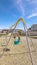 Vertical frame A-frame kids swings in an urban playground