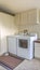 Vertical frame Laundry room in Fallbrook home with white light