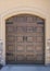 Vertical Garage exterior of a house with french style dark wood doors