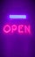 Vertical glowing neon open sign