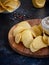 Vertical image beautiful potato chips and sauce in a white bowl