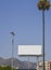 Vertical image of blank white billboard in Los Angeles, California
