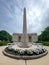 Vertical image of Greenwich`s World War I monument, a 50-foot obelisk that sits in a small