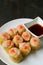 Vertical Image of Shrimp and Pork Filled Chinese Steamed Dumplings or Shumai