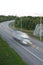 Vertical Image of Tractor Trailler in Motion on Major Highway