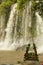 Vertical image of Waterfall on the Siem Reap River. Phnom Kulen, in Cambodia