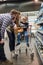 Vertical image of young family choosing a pasta