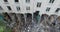 A vertical inspection of a half demolished residential building