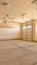 Vertical Interior of the empty garage of a home with unfinished walls and ceiling