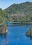 Vertical of Lagunas de Montebello national park view with forested hills near the lake