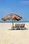 Vertical landscape sea sand beach loungers