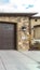 Vertical Large garage with double brown wooden door