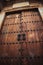 Vertical low angle shot of a beautiful wooden door in the primary cathedral of Bogota, Colombia