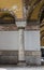 Vertical low angle shot of an old building marble column with beautiful patterns