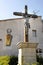 Vertical low angle shot of a statue of Jesus Christ captured in Saintes Maries de la Mer, France