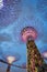 Vertical low angle shot of the towers of Gardens by the Bay illuminated at night, Singapore