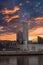 Vertical mesmerizing sunset sky with dense grey cloudscape above the buildings of Aarhus, Denmark