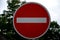 Vertical metal repair signs commanded direction of travel, one way, no entry, pedestrian zone, respirator mask dead end street in