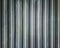 Vertical metallic lines texture background
