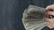 Vertical money gestures financial fraud dollar