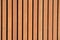 Vertical natural wooden slats on the wall.
