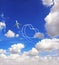 Vertical nature background with aircraft draw a heart in the sky. Flight route of aircraft in shape of a heart