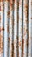 Vertical old metal sheet texture pattern. Rusty metal sheet texture