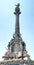 Vertical Panoramic Christopher Columbus Monument at the La Rambla Water Front of Barcelona, Spain. Blue sky