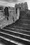 Vertical panoramic monochrome view of stairs on the Mutianyu section of the Great Wall of China leading to a watch tower