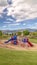 Vertical Park and playground wth a scenic view of Mount Timpanogos towering over a lake