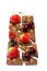 Vertical photo of chocolate bar rich in hazelnuts with different fruit on it. Isolated on white background temptation weight loss