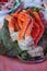 Vertical photo of delicious cooked crab legs in seafood party