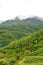 Vertical photo of green Taiwanese lanscape by Thousand Island Lake. Adjacent Pinglin Tea Plantation by the coast. Foggy, moody