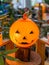 Vertical photo of plastic halloween pumpkin jack o lantern