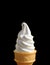 Vertical Photo of Pure White Vanilla Soft Serve Ice Cream Cone Isolated on Black Background with Free Space