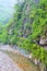 Vertical photo of Taroko National Park in Taiwan. Named after Taroko Gorge by the Liwu River. Green tropical forests surrounded by
