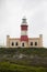 Vertical photograph of the Cape Agulhas lighthouse. This lighthouse divides the Atlantic Ocean and the Indian Ocean in South