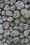 Vertical photograph of a decorative pattern of stones from the sea shore