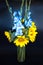 Vertical picture of beautiful bouquet of blue gladioli and flowers of sunflower, glass vase of flowers on black background. Summer