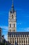 Vertical picture of the facade of the Belfry Het Belfort of Ghent taken from Sint-Baafsplein, in Belgium, Europe, during a sunny