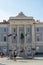 Vertical picture of the facade of Town Hall and Giuseppe Tartini Statue in Tartini Square, in the old town of Piran, in Slovenia