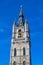 Vertical picture of the medieval tower of the Belfry Het Belfort of Ghent taken from Sint-Baafsplein, in Belgium, Europe, during