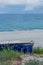 Vertical picture of old boat on a beach