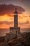Vertical picture of the Punta Nariga lighthouse surrounded by the sea during the sunset in Spain