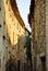 Vertical picture of scenic stone narrow street with medieval lantern in Lourmarin, one of the most beautiful villages of France