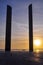 Vertical picture of the silhouettes of high-rise buildings during a beautiful sunset