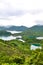 Vertical picture of stunning Taiwanese landscape by Thousand Island Lake and Pinglin Tea Plantations photographed in moody weather