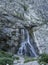 Vertical picturesque natural landscape mountain waterfall