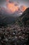 Vertical picturesque view of an old town surrounded by rocks and forests. Matterhorn